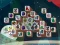 Leikur Among Mahjong Tiles á netinu